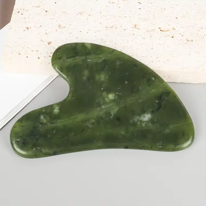 Outil de massage Gua Sha en jade Xiuyan