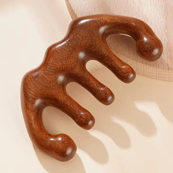 Peigne de massage en bois pour la tête