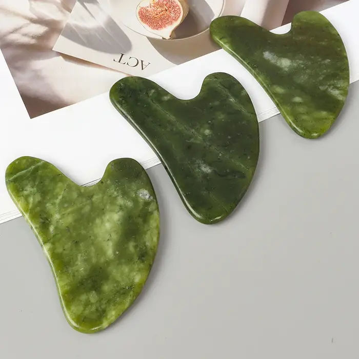 Outil de massage Gua Sha en jade Xiuyan