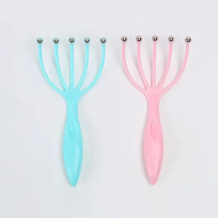 Peigne de massage pour la tête