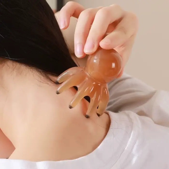 Peigne de Massage en résine poulpe