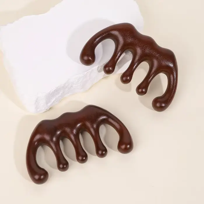 Peigne de massage en bois pour la tête