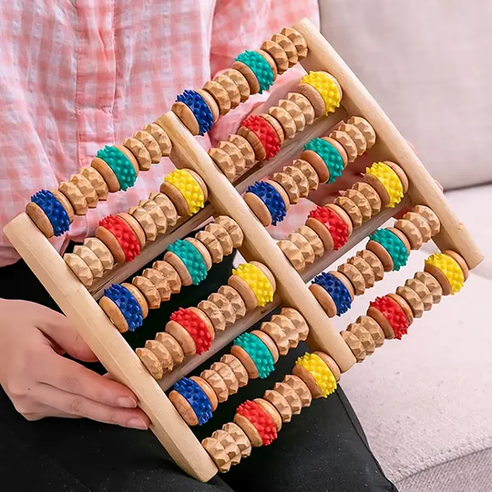 Rouleau de massage pour les pieds en bois
