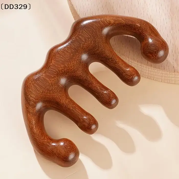 Peigne de massage thérapeutique pour la tête