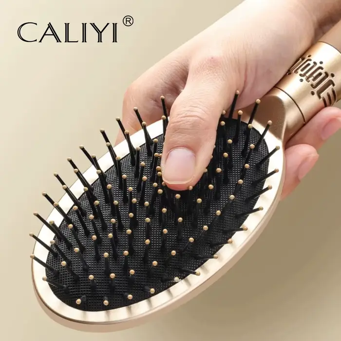 CALIYI cheveux Massage coussin d'air peigne brosse cuir chevelu