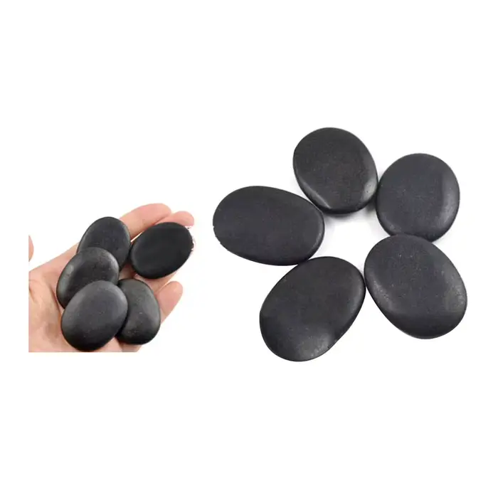 Ensemble de pierres naturelles de massage au charbon chaud