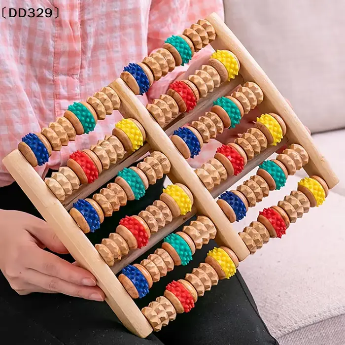 Rouleau de massage pour les pieds en bois