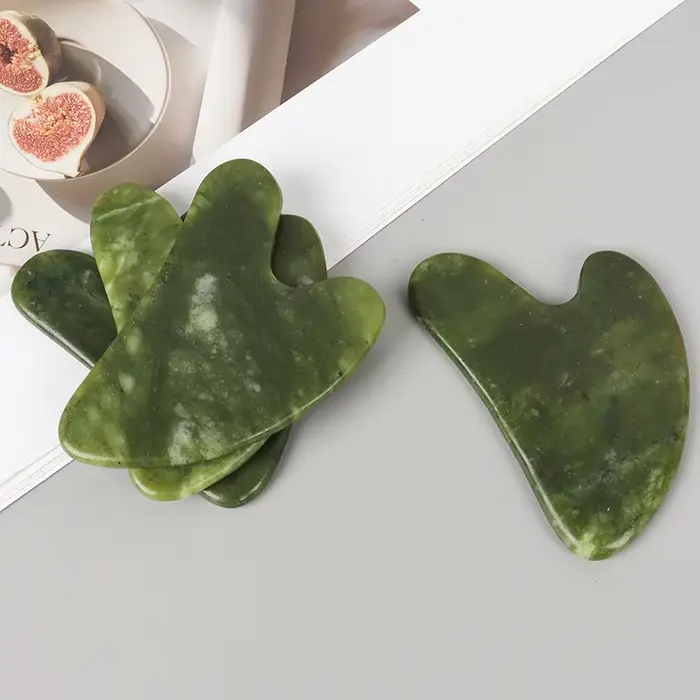Outil de massage Gua Sha en jade Xiuyan